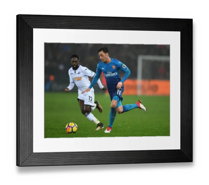 Framed Print : Mesut Ozil vs. Nathan Dyer: A Premier League Battle at Swansea's Liberty Stadium (Arsenal vs. Swansea City, 2017-18) Framed Print : Mesut Ozil vs. Nathan Dyer: A Premier League Battle at Swansea's Liberty Stadium (Arsenal vs. Swansea City, 2017-18)