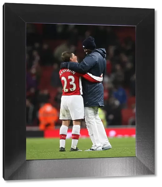 Ardrey Arshavin and Emmanuel Adebayor celebrate the Arsenal victory