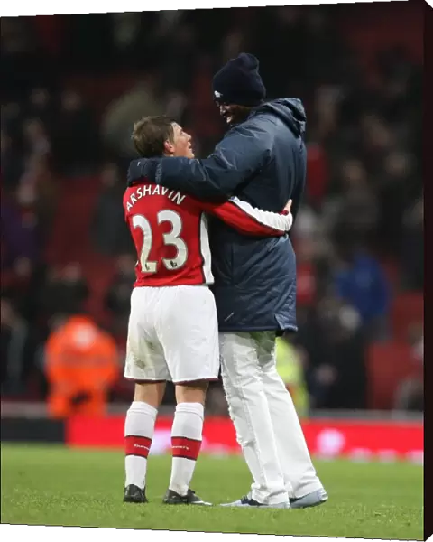 Ardrey Arshavin and Emmanuel Adebayor celebrate the Arsenal victory