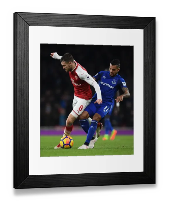 Framed Print : Clash at the Emirates: Ramsey vs. Walcott Battle for Possession Framed Print : Clash at the Emirates: Ramsey vs. Walcott Battle for Possession