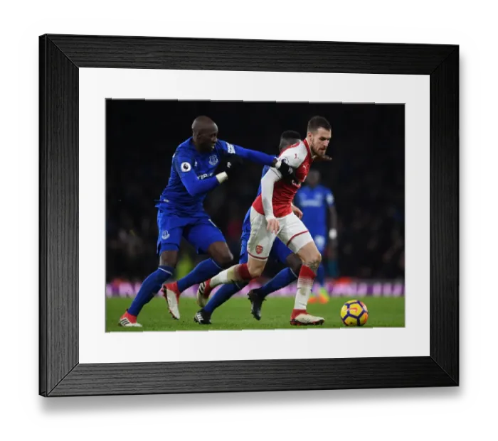Framed Print : Arsenal's Aaron Ramsey Outwits Everton's Mangala: A Premier League Showdown Framed Print : Arsenal's Aaron Ramsey Outwits Everton's Mangala: A Premier League Showdown