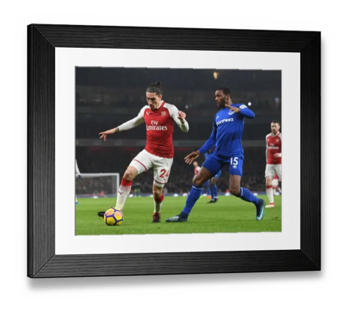 Framed Print : Arsenal's Hector Bellerin Clashes with Everton's Cuco Martina in Premier League Showdown