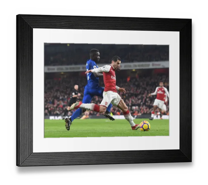 Framed Print : Arsenal's Mkhitaryan Clashes with Everton's Martina in Premier League Showdown