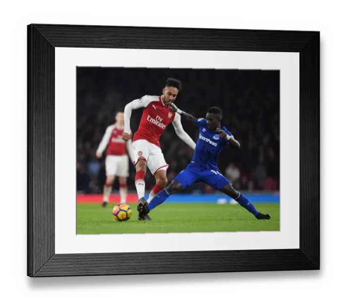 Framed Print : Arsenal's Aubameyang Clashes with Everton's Gueye in Premier League Showdown Framed Print : Arsenal's Aubameyang Clashes with Everton's Gueye in Premier League Showdown