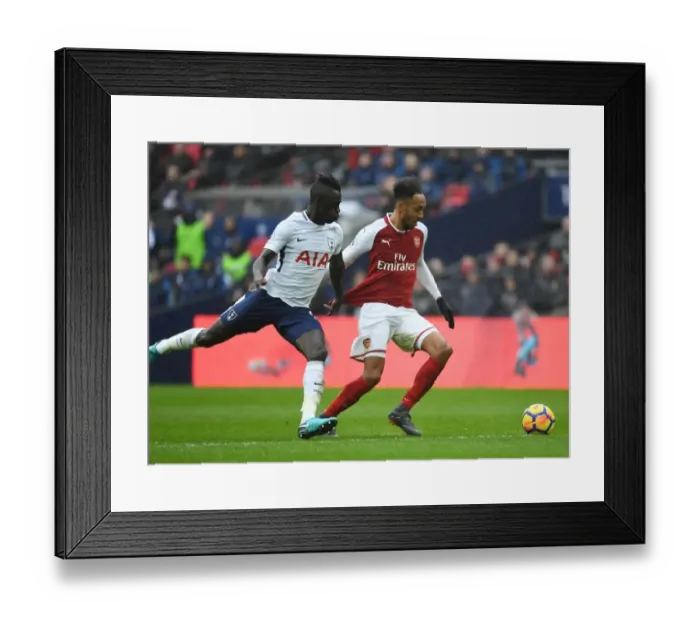 Framed Print : Clash of Titans: Aubameyang vs Sanchez - A Premier League Rivalry: Arsenal's Aubameyang vs Tottenham's Sanchez