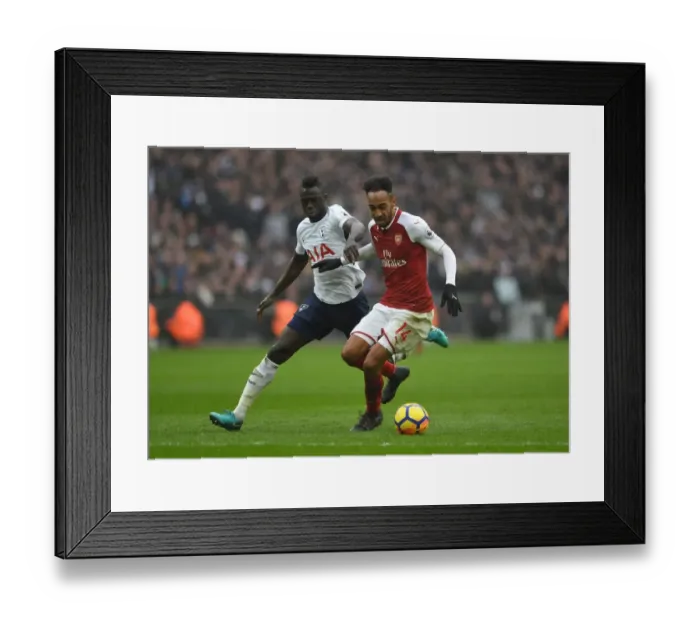 Framed Print : Aubameyang vs Sanchez: Intense Battle in Tottenham Hotspur vs Arsenal Premier League Clash