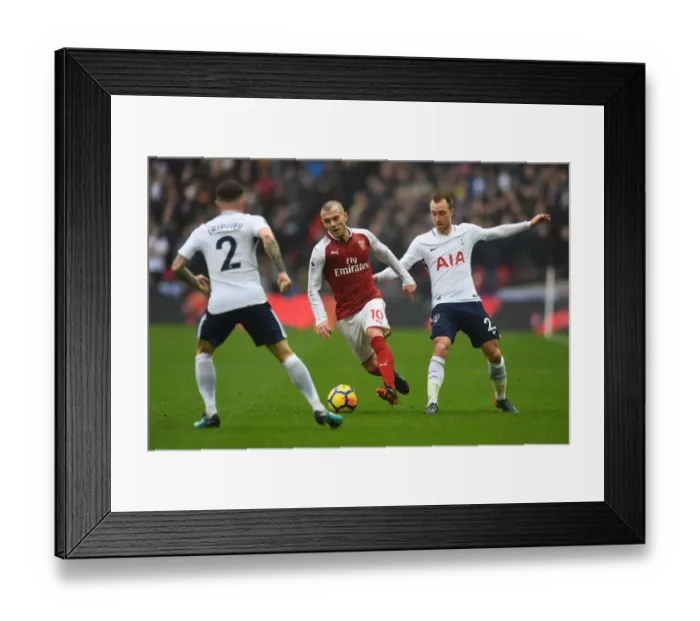 Framed Print : Clash of Midfield Maestros: Wilshere vs. Eriksen - Tottenhotspur vs. Arsenal, Premier League Framed Print : Clash of Midfield Maestros: Wilshere vs. Eriksen - Tottenhotspur vs. Arsenal, Premier League