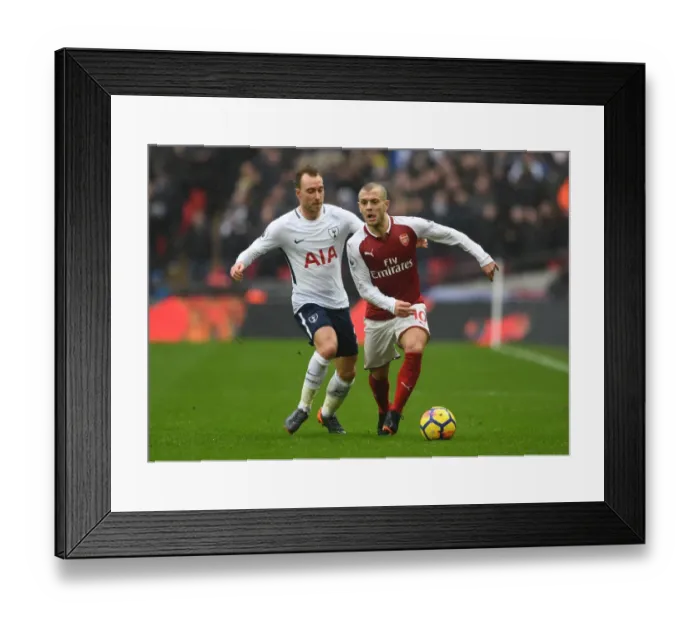 Framed Print : Clash of Midfield Geniuses: Wilshere vs. Eriksen - A Premier League Showdown Framed Print : Clash of Midfield Geniuses: Wilshere vs. Eriksen - A Premier League Showdown