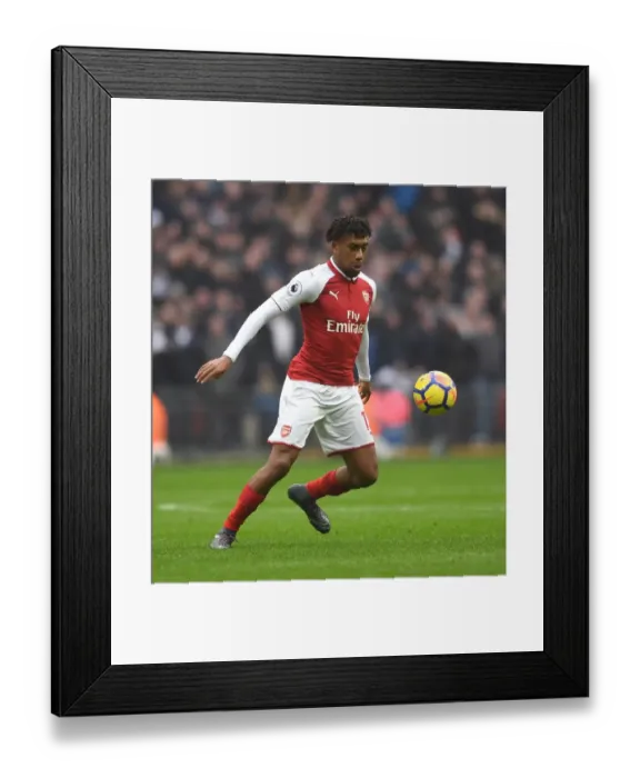 Framed Print : Alex Iwobi's Winning Goal: Arsenal Triumphs 1-0 over Tottenham at Wembley Framed Print : Alex Iwobi's Winning Goal: Arsenal Triumphs 1-0 over Tottenham at Wembley