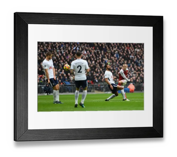 Framed Print : Jack Wilshere (Arsenal) shoots under pressure from Mousa Dembele (Tottenham)