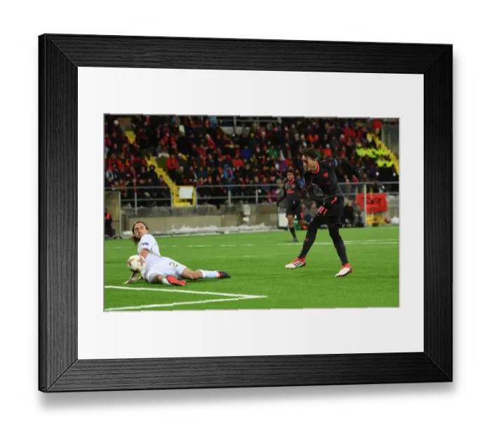 Framed Print : Mesut Ozil Scores His Third: Arsenal's Europa League Triumph over Ostersunds FK Framed Print : Mesut Ozil Scores His Third: Arsenal's Europa League Triumph over Ostersunds FK