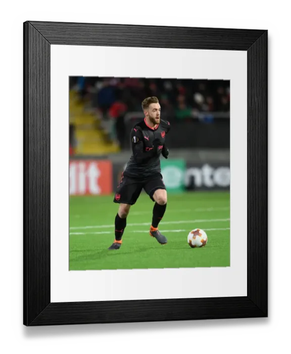 Framed Print : Calum Chambers in Action: Arsenal's Europa League Battle against Ostersunds FK