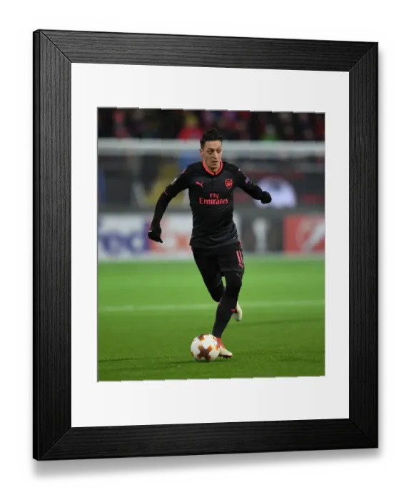Framed Print : Mesut Ozil Shines: Arsenal's Europa League Victory over Ostersunds FK