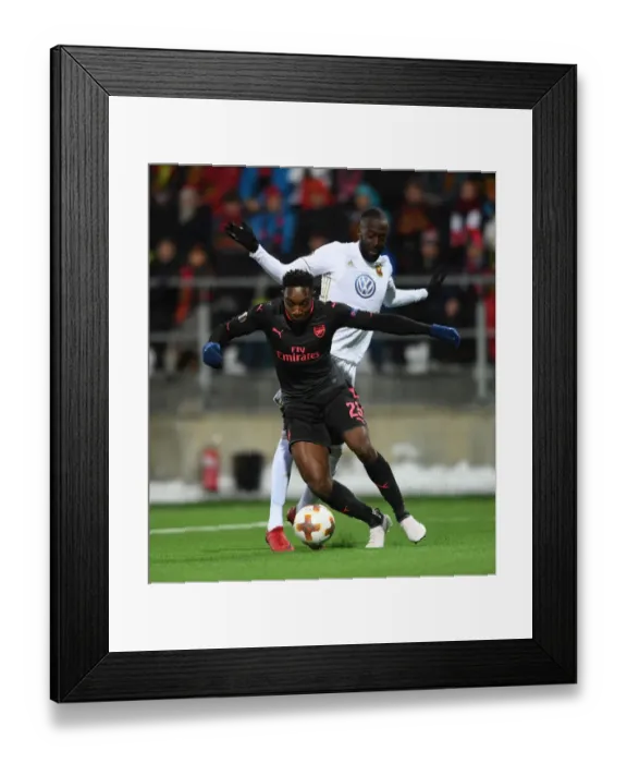 Framed Print : Danny Welbeck vs. Ronald Mukibi: Clash in the Europa League between Ostersunds and Arsenal Framed Print : Danny Welbeck vs. Ronald Mukibi: Clash in the Europa League between Ostersunds and Arsenal