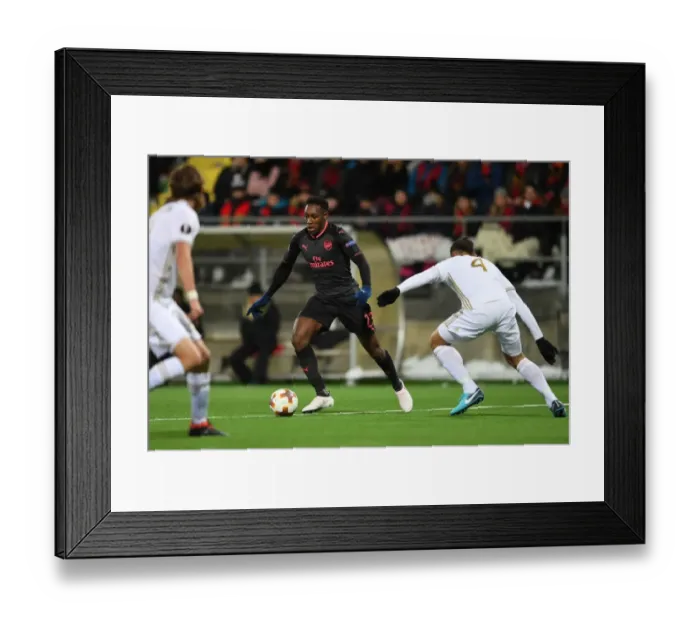 Framed Print : Danny Welbeck vs. Sotirios Papagiannopoulos: A Battle in the Europa League between Ostersunds and Arsenal Framed Print : Danny Welbeck vs. Sotirios Papagiannopoulos: A Battle in the Europa League between Ostersunds and Arsenal