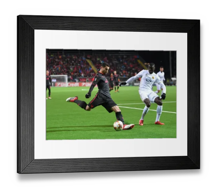 Framed Print : Mkhitaryan vs Sema: Intense Battle in Ostersund's Europa League Clash Against Arsenal