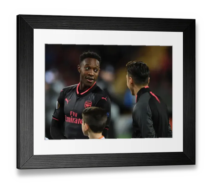 Framed Print : Arsenal's Welbeck and Ozil Engage Before Ostersunds Clash Framed Print : Arsenal's Welbeck and Ozil Engage Before Ostersunds Clash