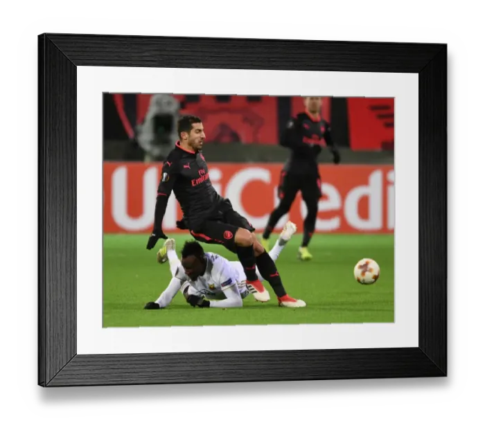 Framed Print : Mkhitaryan vs Mensah: Battle in the Europa League between Ostersunds and Arsenal Framed Print : Mkhitaryan vs Mensah: Battle in the Europa League between Ostersunds and Arsenal