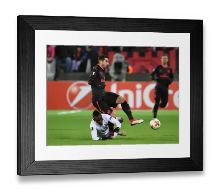 Framed Print : Mkhitaryan vs Mensah: Intense Clash in Ostersund's Europa League Showdown Framed Print : Mkhitaryan vs Mensah: Intense Clash in Ostersund's Europa League Showdown