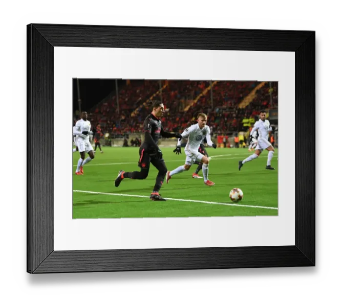 Framed Print : Hector Bellerin vs. Dennis Widgren: Battle in the Europa League between Ostersunds and Arsenal