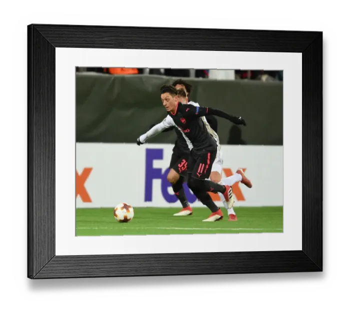 Framed Print : Mesut Ozil Clashes with Dennis Widgren: Ostersunds FK vs Arsenal, UEFA Europa League Framed Print : Mesut Ozil Clashes with Dennis Widgren: Ostersunds FK vs Arsenal, UEFA Europa League