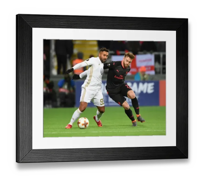 Framed Print : Chambers vs. Ghoddos: Battle in the Europa League between Ostersunds and Arsenal Framed Print : Chambers vs. Ghoddos: Battle in the Europa League between Ostersunds and Arsenal