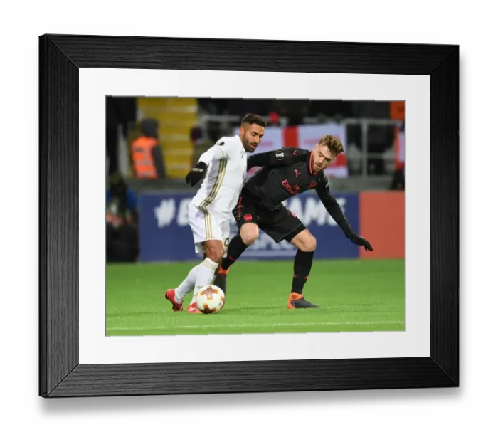 Framed Print : Chambers vs. Ghoddos: A Europa League Battle at Ostersunds