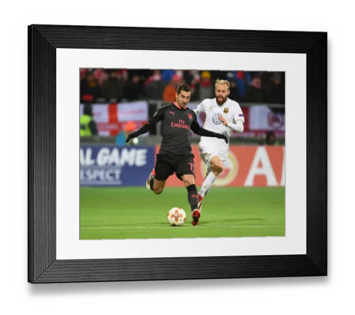 Framed Print : Henrikh Mkhitaryan vs Curtis Edwards: Battle in the Europa League between Ostersunds and Arsenal Framed Print : Henrikh Mkhitaryan vs Curtis Edwards: Battle in the Europa League between Ostersunds and Arsenal