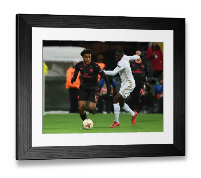 Framed Print : Arsenal's Alex Iwobi vs. Ken Sema: A Europa League Battle Framed Print : Arsenal's Alex Iwobi vs. Ken Sema: A Europa League Battle