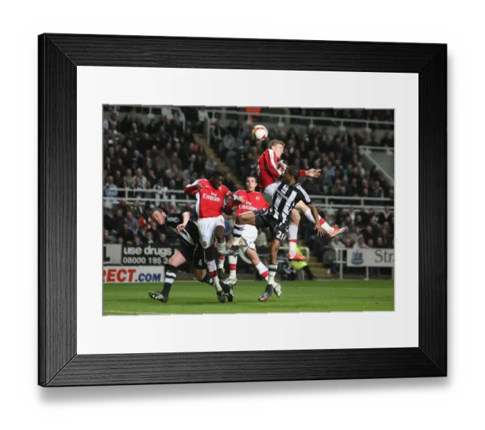 Framed Print : Bendtner's Epic Header: Arsenal's 3-1 Victory Over Newcastle, 2009