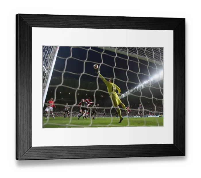Framed Print : Bendtner's Epic Leap: The First Arsenal Goal vs. Newcastle, 2009