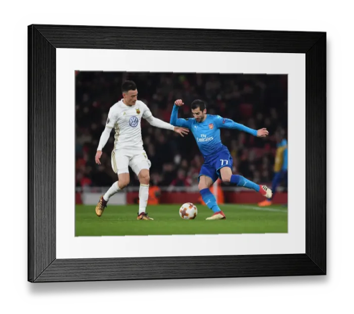 Framed Print : Arsenal's Mkhitaryan Clashes with Östersunds Hopcutt in Europa League Showdown Framed Print : Arsenal's Mkhitaryan Clashes with Östersunds Hopcutt in Europa League Showdown