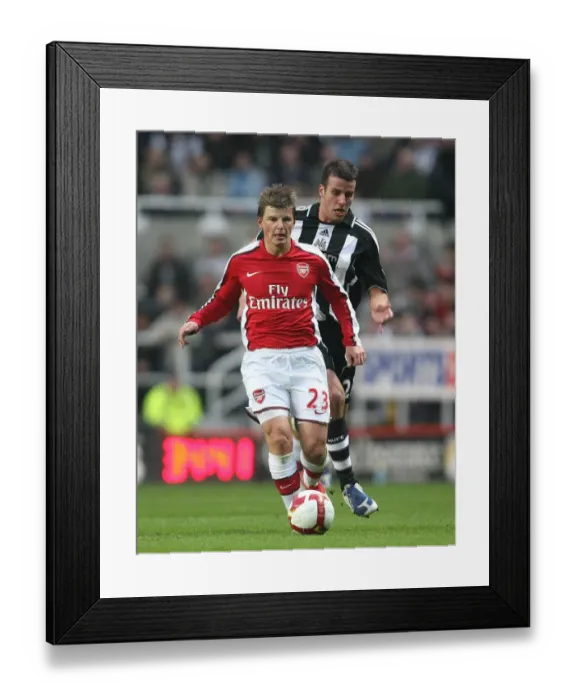 Framed Print : Andrey Arshavin (Arsenal) Steven Taylor (Newcastle)