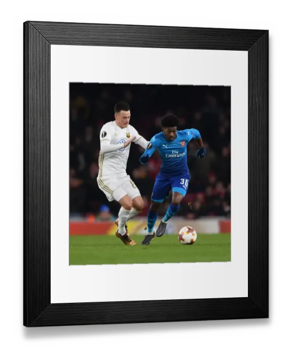 Framed Print : Maitland-Niles vs. Hopcutt: A Battle on the Emirates Field - Arsenal vs. Östersunds (2018) Framed Print : Maitland-Niles vs. Hopcutt: A Battle on the Emirates Field - Arsenal vs. Östersunds (2018)