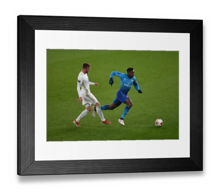Framed Print : Danny Welbeck vs. Dennis Widgren: Arsenal's Europa League Battle