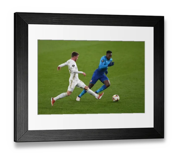 Framed Print : Arsenal's Europa League Battle: Welbeck vs. Widgren