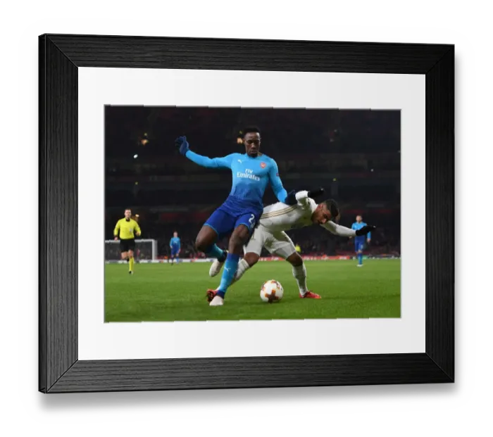 Framed Print : Danny Welbeck vs. Hosam Aiesh: Arsenal's Battle in Europa League Against Östersunds Framed Print : Danny Welbeck vs. Hosam Aiesh: Arsenal's Battle in Europa League Against Östersunds