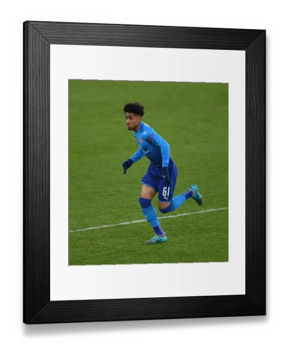 Framed Print : Reiss Nelson in Action: Arsenal vs Östersunds FK, UEFA Europa League 2017-18