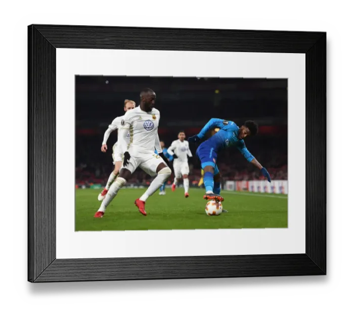 Framed Print : Arsenal's Ainsley Maitland-Niles vs. Östersunds Ken Sema: A Europa League Battle Framed Print : Arsenal's Ainsley Maitland-Niles vs. Östersunds Ken Sema: A Europa League Battle