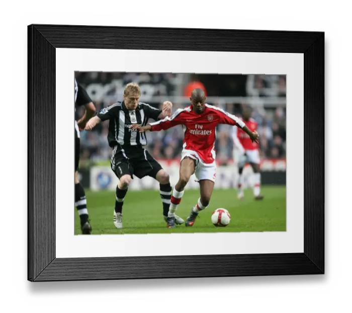 Framed Print : Triumphant Trios: Abou Diaby and Damien Duff Clash in Arsenal's 3-1 Victory over Newcastle United, 2009 Framed Print : Triumphant Trios: Abou Diaby and Damien Duff Clash in Arsenal's 3-1 Victory over Newcastle United, 2009