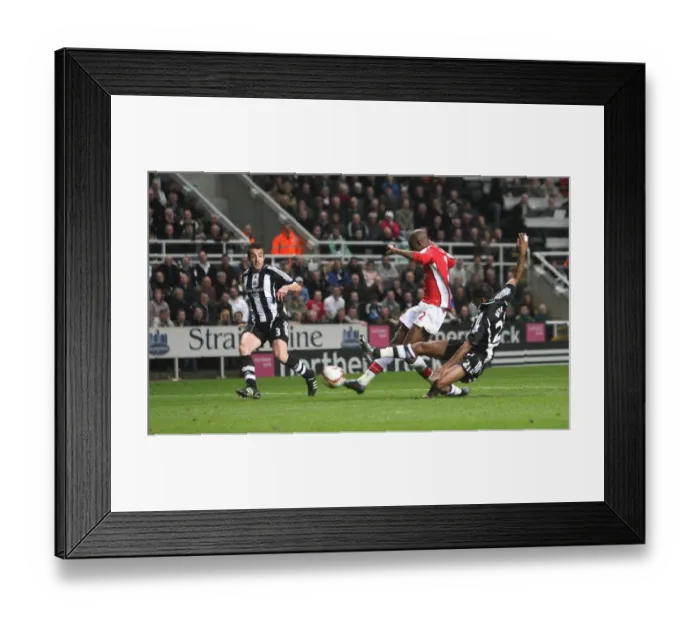 Framed Print : Abou Diaby shoots past Newcastle goalkeeper Steve Harper