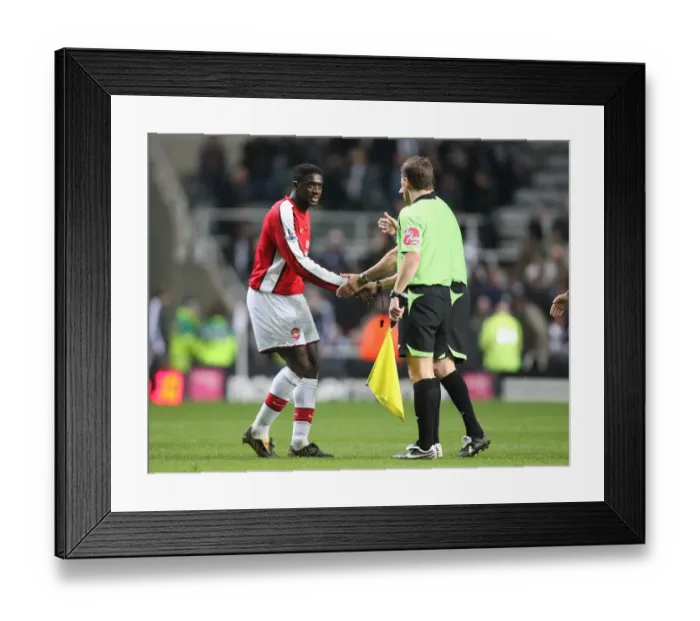Framed Print : Arsenal captain Kolo Toure shakes hands with officials