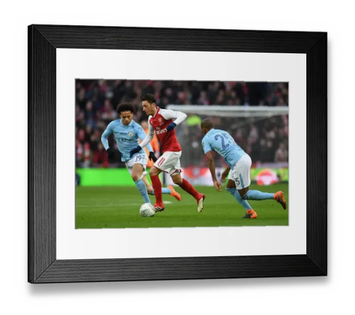 Framed Print : Mesut Ozil vs Leroy Sane: Clash of the Stars in the Arsenal v Manchester City Carabao Cup Final Framed Print : Mesut Ozil vs Leroy Sane: Clash of the Stars in the Arsenal v Manchester City Carabao Cup Final