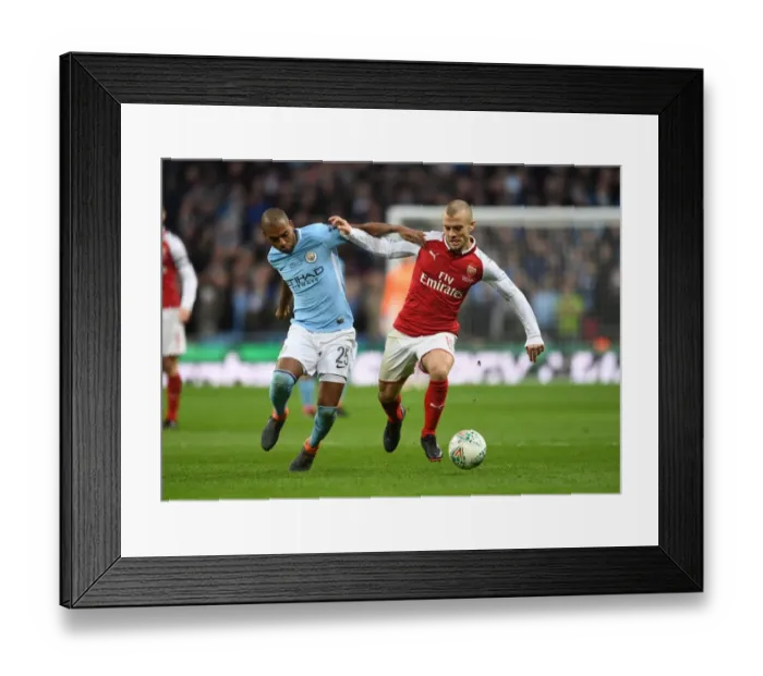 Framed Print : Arsenal's Jack Wilshere Clashes with Manchester City's Fernandinho in Carabao Cup Final Showdown Framed Print : Arsenal's Jack Wilshere Clashes with Manchester City's Fernandinho in Carabao Cup Final Showdown