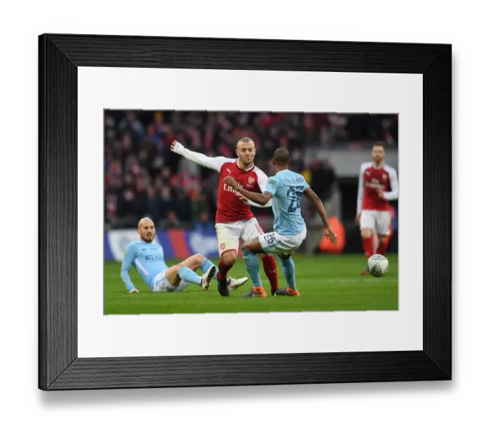 Framed Print : Jack Wilshere vs Fernandinho: Battle at the Carabao Cup Final
