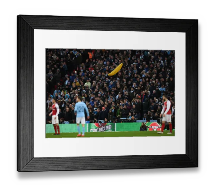 Framed Print : The Great Inflatable Banana Duel: Arsenal vs Manchester City - Carabao Cup Final Framed Print : The Great Inflatable Banana Duel: Arsenal vs Manchester City - Carabao Cup Final