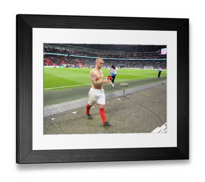 Framed Print : Jack Wilshere's Heartfelt Gesture: Throwing His Shirt to a Fan Amidst Manchester City's Carabao Cup Victory Framed Print : Jack Wilshere's Heartfelt Gesture: Throwing His Shirt to a Fan Amidst Manchester City's Carabao Cup Victory