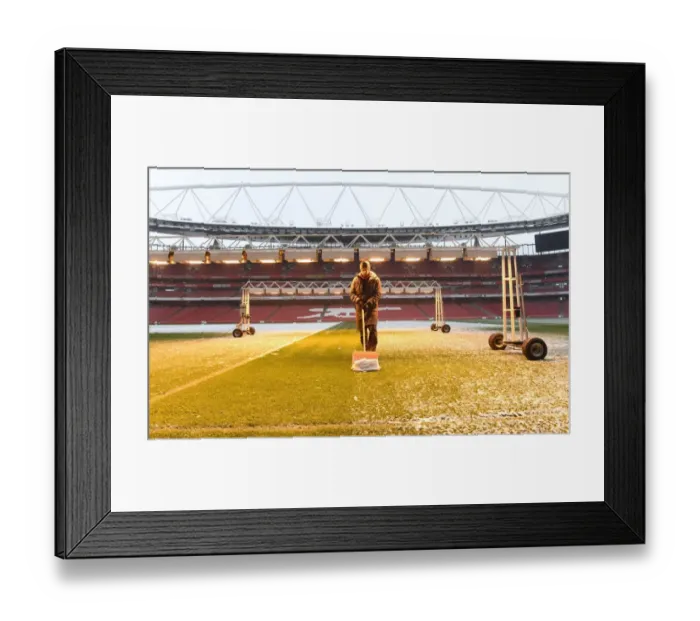 Framed Print : Arsenal's Winter Battle: Clearing the Pitch vs Manchester City Framed Print : Arsenal's Winter Battle: Clearing the Pitch vs Manchester City