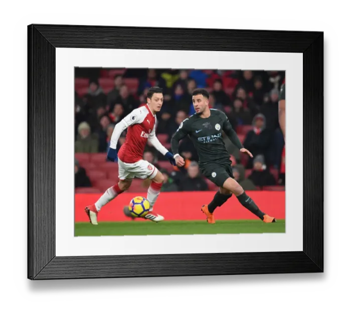 Framed Print : Mesut Ozil vs. Kyle Walker: Clash of the Stars in Arsenal vs. Manchester City