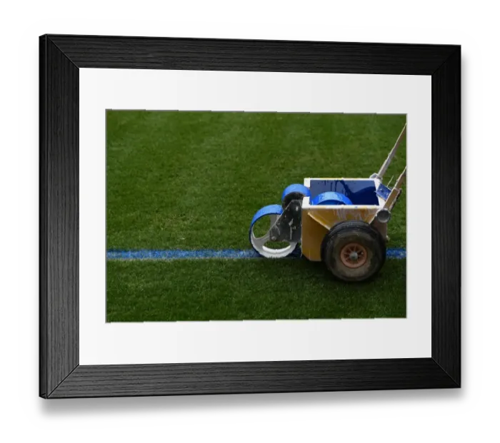 Framed Print : Arsenal Grounds Team Readies Blue Turf for Arsenal vs Manchester City Showdown Framed Print : Arsenal Grounds Team Readies Blue Turf for Arsenal vs Manchester City Showdown